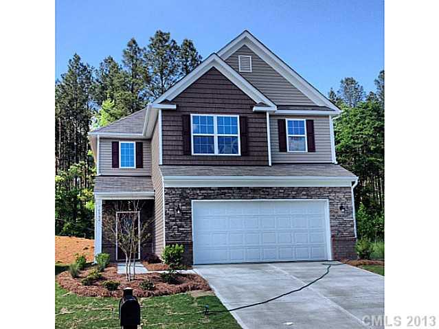 78042 Rillstone Drive Lancaster, SC 29720 - Photo 1 of 4 a front view of a house with yard