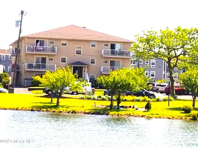 a view of a house with a swimming pool
