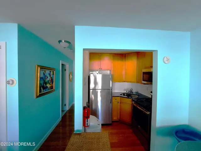 a car parked in parking lot of a parking