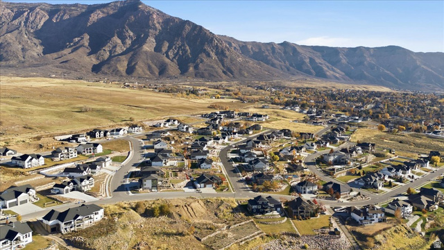 1211 West Fallow Way Ogden, UT 84414 - Photo 17 of 20 View of mountain backdrop featuring nearby suburban area