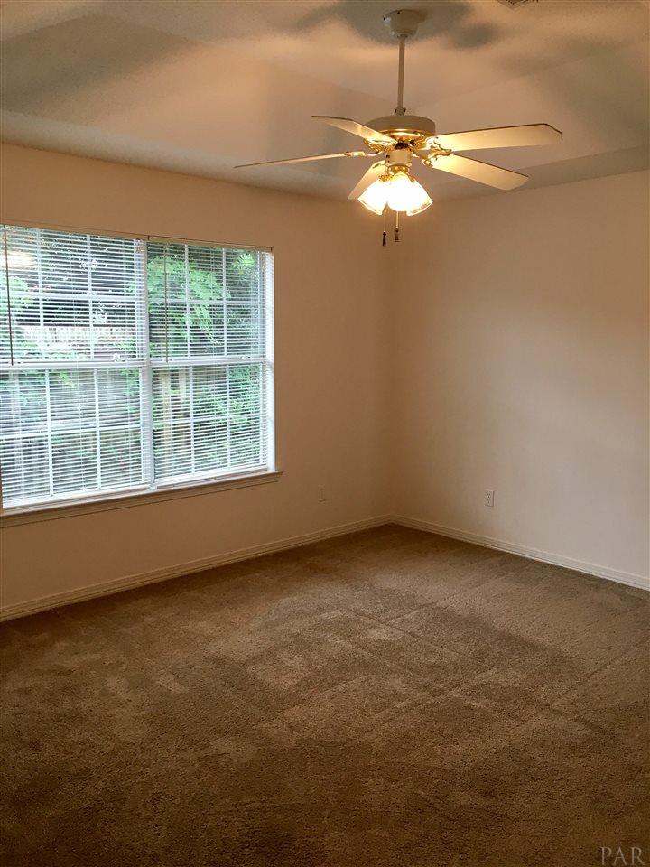 8411 Ramsgate Road Pensacola, FL 32514 - Photo 10 of 12 Trey ceilings, ceiling fan, walk in closets