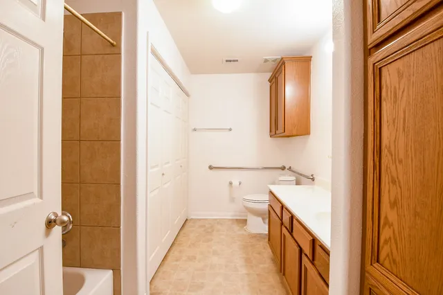a bathroom with a sink and mirror