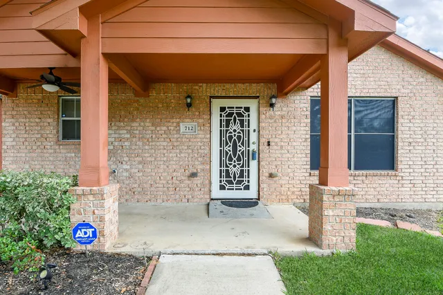 a front view of a house with a garage