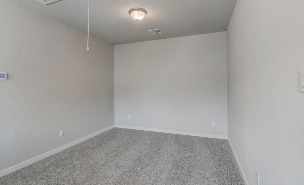 8403 Arden Valley Lane Houston, TX 77063 - Photo 18 of 32 a view of an empty room