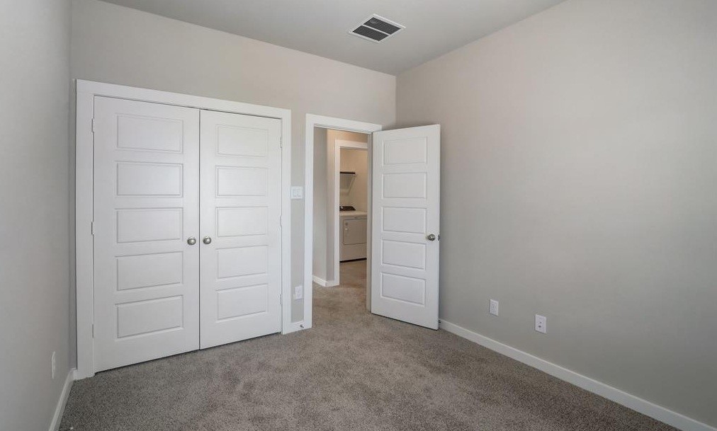 8403 Arden Valley Lane Houston, TX 77063 - Photo 22 of 32 an empty room with closet area