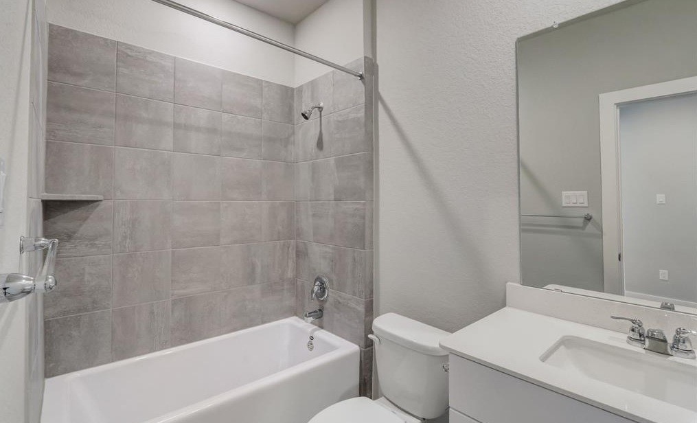 8403 Arden Valley Lane Houston, TX 77063 - Photo 24 of 32 a bathroom with a sink toilet and shower