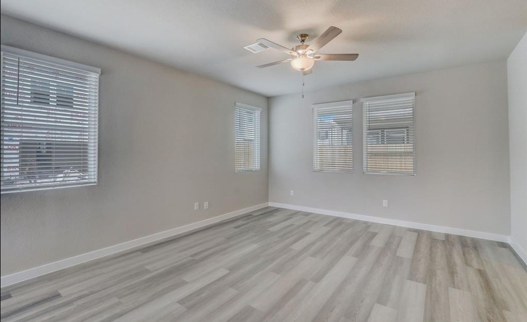 8403 Arden Valley Lane Houston, TX 77063 - Photo 5 of 32 a view of an empty room with a window
