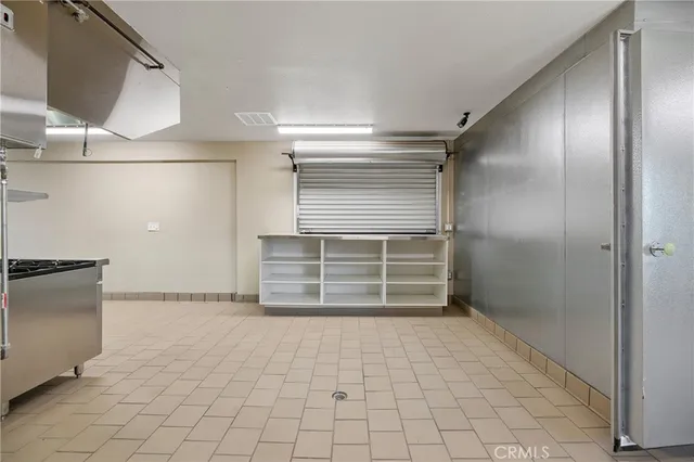 a view of room with furniture and a flat screen tv