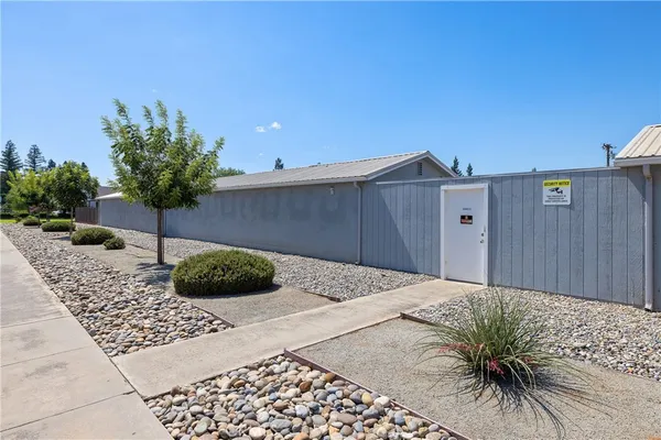 a house view with a backyard space