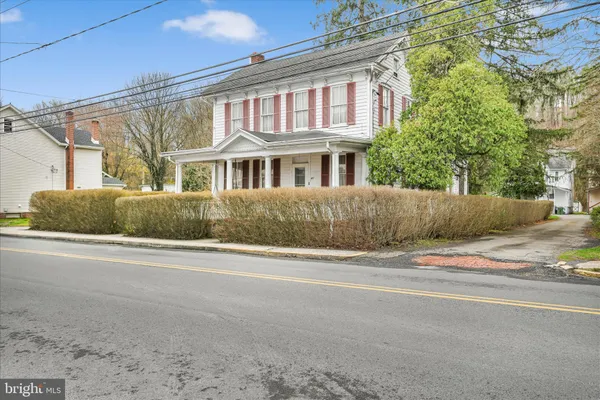 front view of a house with a street