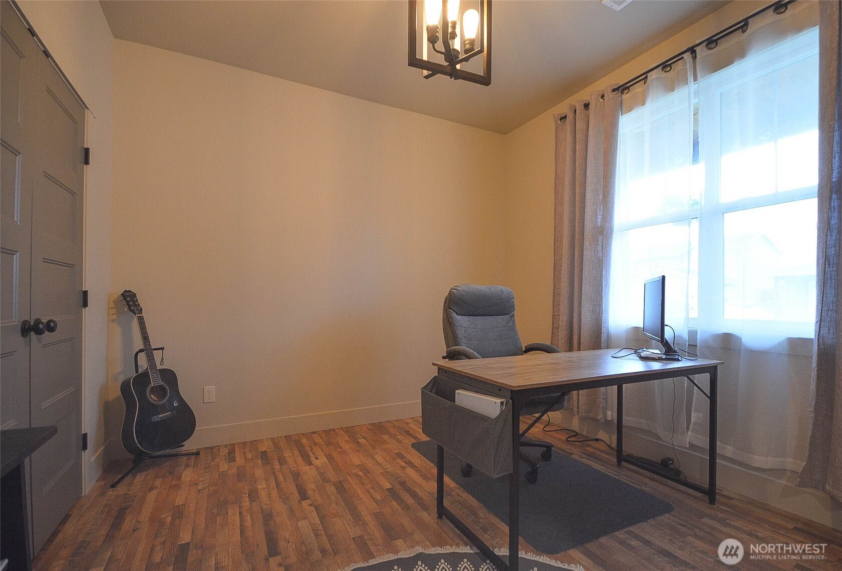 259 Parkside Loop Chehalis, WA 98532 - Photo 8 of 39 a view of a workspace with furniture and a window