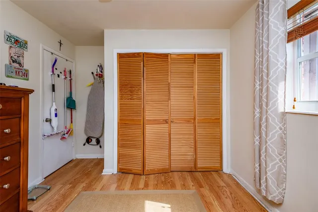 a view of entryway with wooden floor