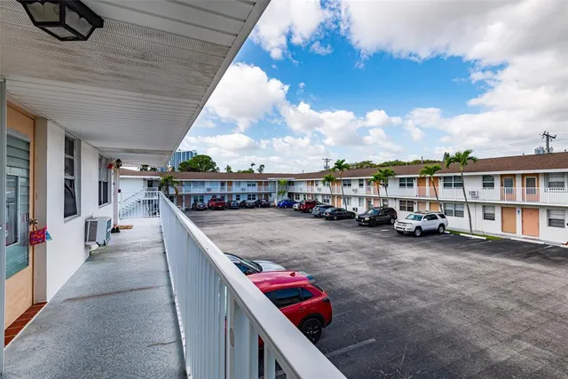 a view of a swimming pool with a park