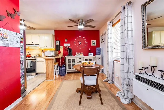 a kitchen with a sink appliances and cabinets