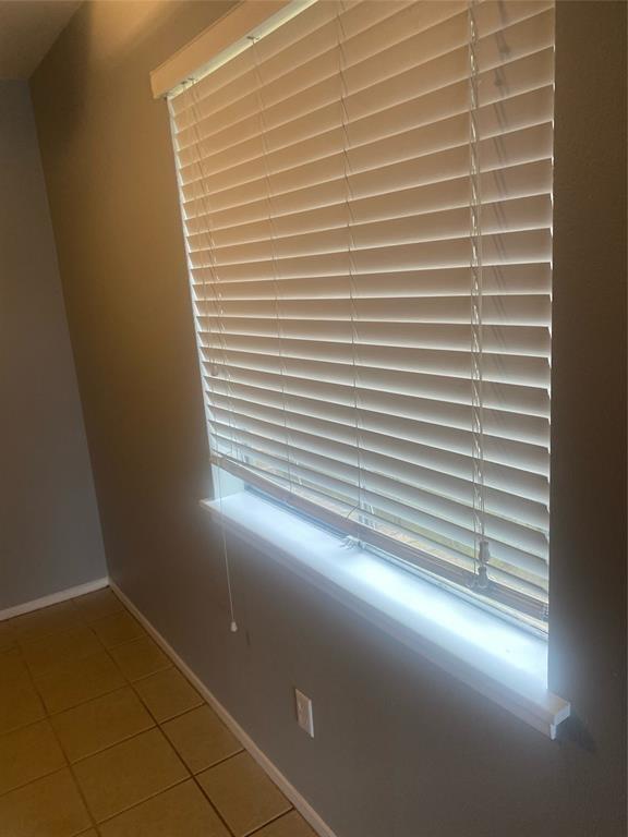 8114 Sonnet Avenue, Unit 102 Austin, TX 78759 - Photo 6 of 12 a view of a room with a window