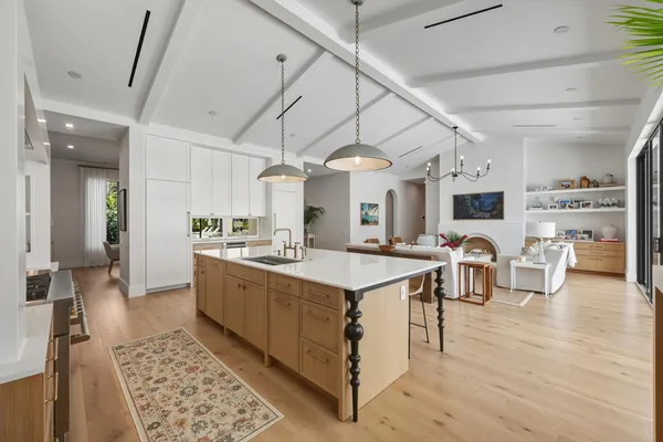 a kitchen with a cabinets and window