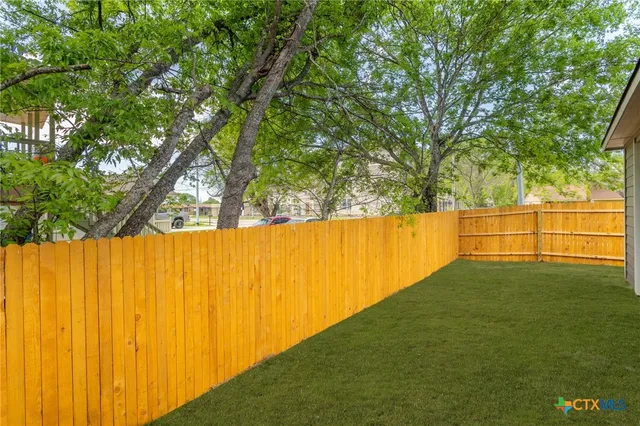 a view of outdoor space and yard
