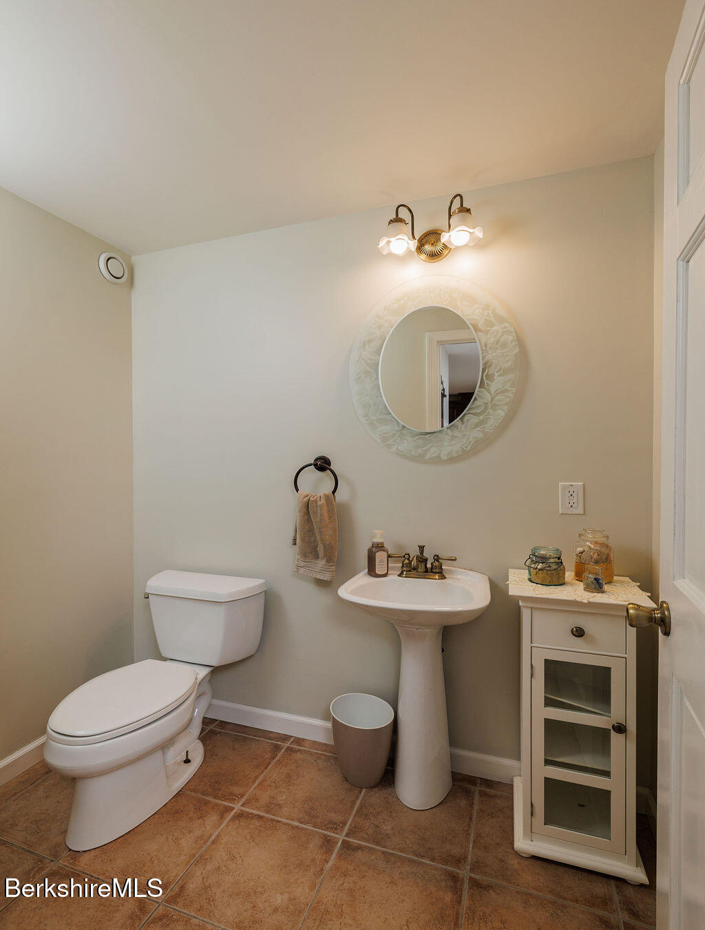45 State Line Road West Stockbridge, MA 01266 - Photo 12 of 34 a bathroom with a toilet sink and mirror
