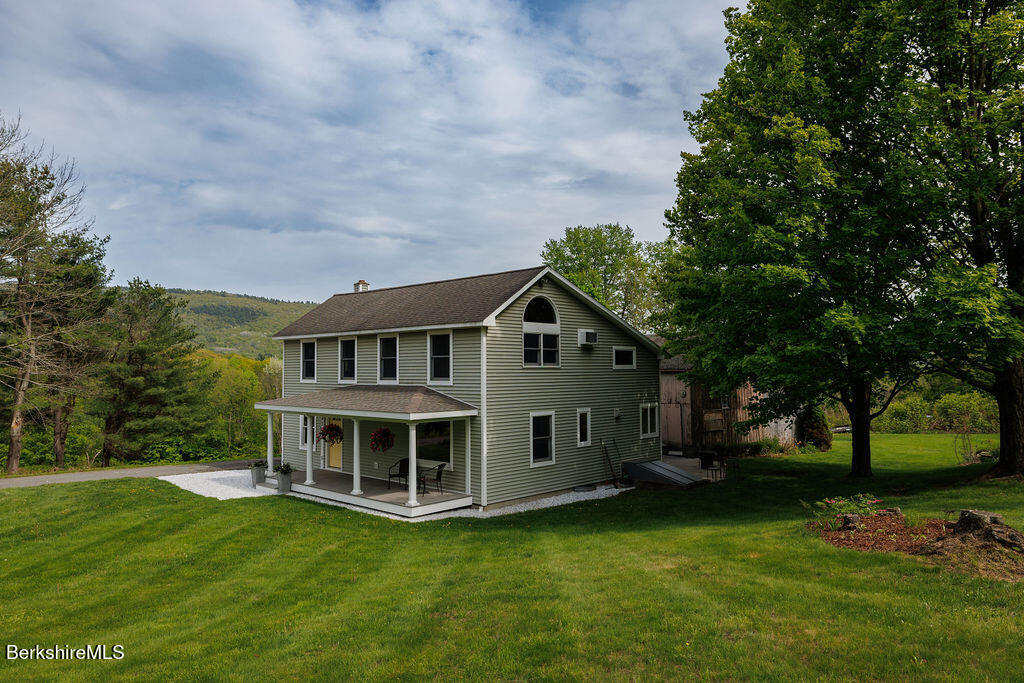 45 State Line Road West Stockbridge, MA 01266 - Photo 2 of 34 a view of a house with a big yard