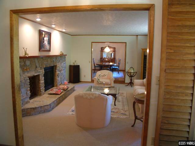1635 Heitman Court Reno, NV 89509 - Photo 8 of 9 a living room with furniture and a fireplace
