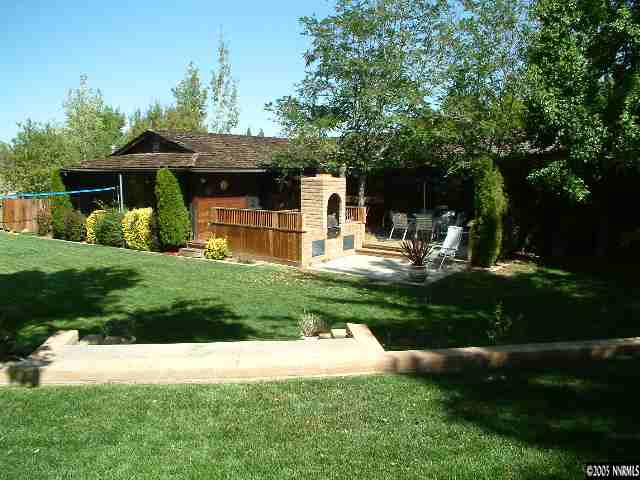 1635 Heitman Court Reno, NV 89509 - Photo 9 of 9 a front view of house with yard and green space