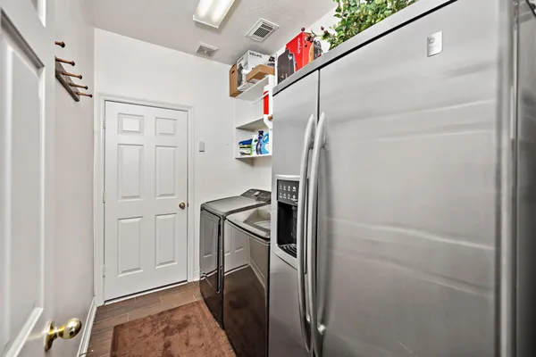 a bathroom with a toilet a sink and a bathtub