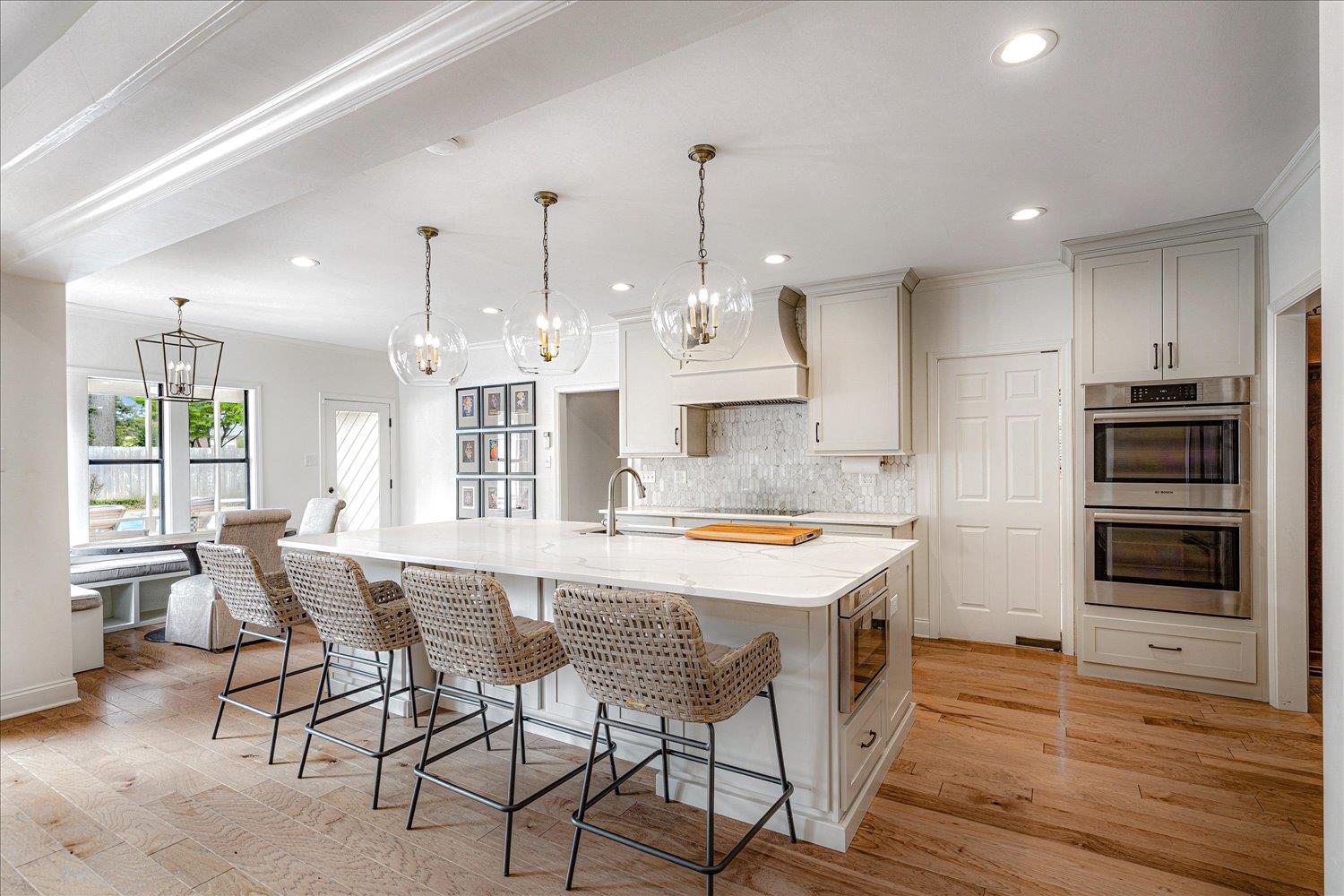 6677 Neshoba Road Memphis, TN 38120 - Photo 16 of 40 a large kitchen with a table and chairs in it