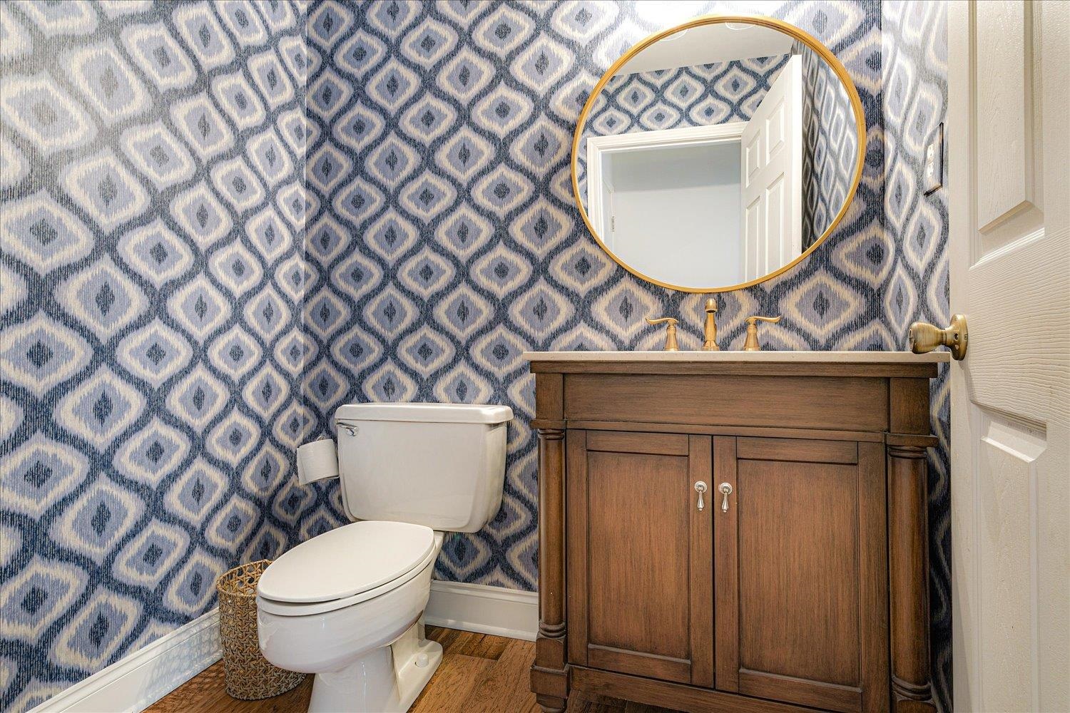 6677 Neshoba Road Memphis, TN 38120 - Photo 22 of 40 a bathroom with a toilet and a sink