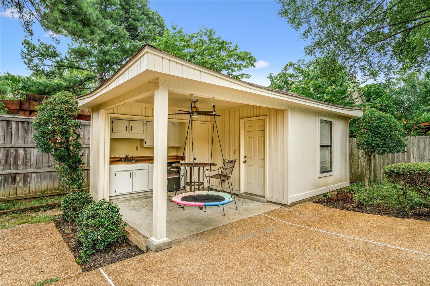 6677 Neshoba Road Memphis, TN 38120 - Photo 39 of 40 a view of a house with backyard