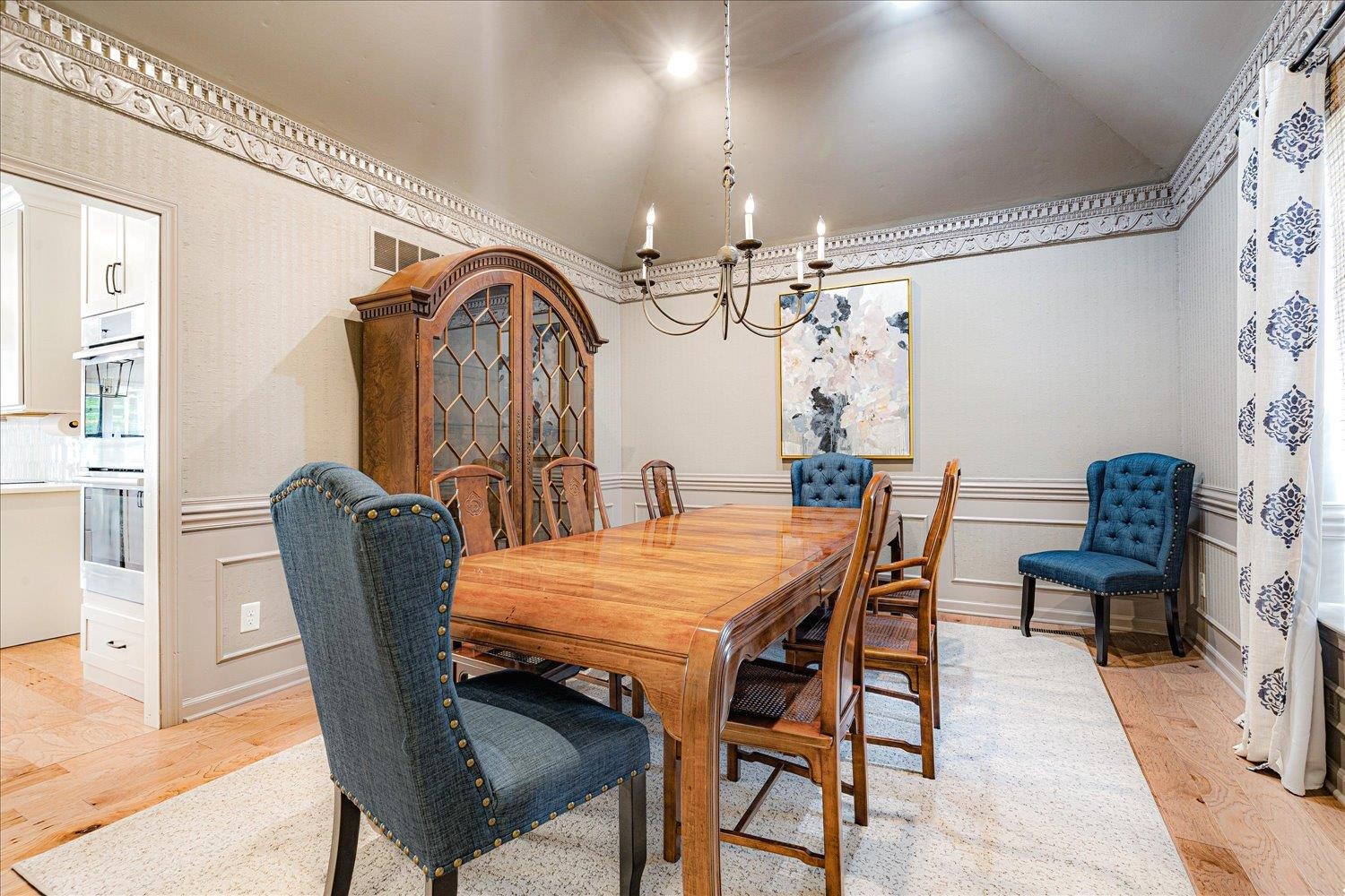 6677 Neshoba Road Memphis, TN 38120 - Photo 8 of 40 a view of a dining room with furniture and chandelier