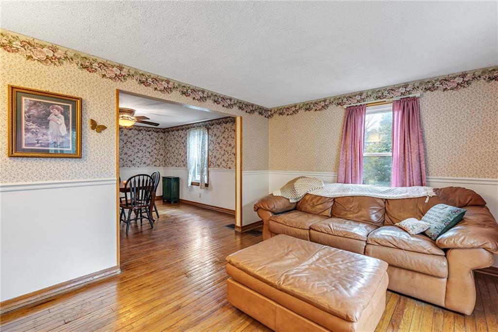 290 Jackson Street Rochester, PA 15074 - Photo 3 of 16 a living room with furniture and wooden floor