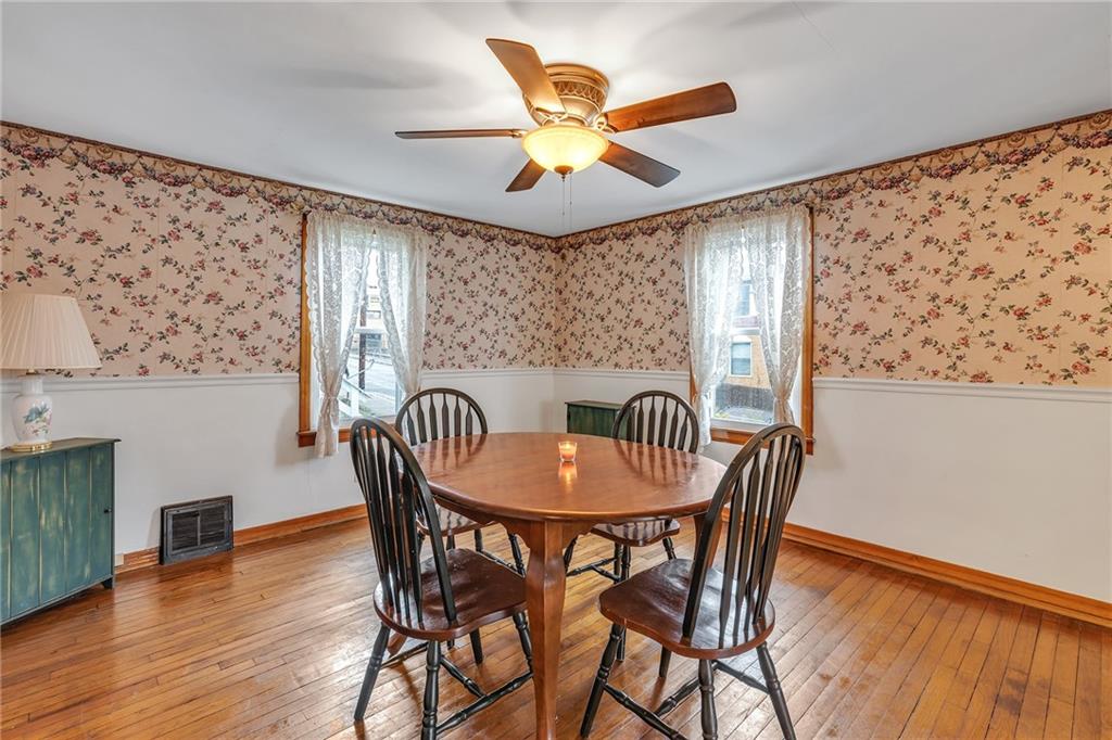 290 Jackson Street Rochester, PA 15074 - Photo 5 of 16 a view of a dining room with furniture and window