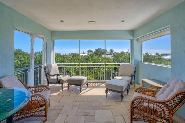 a view of a room with a large window