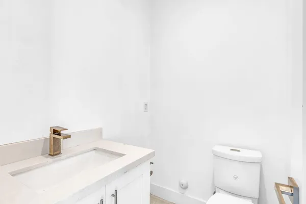 a bed room with furniture and a large window