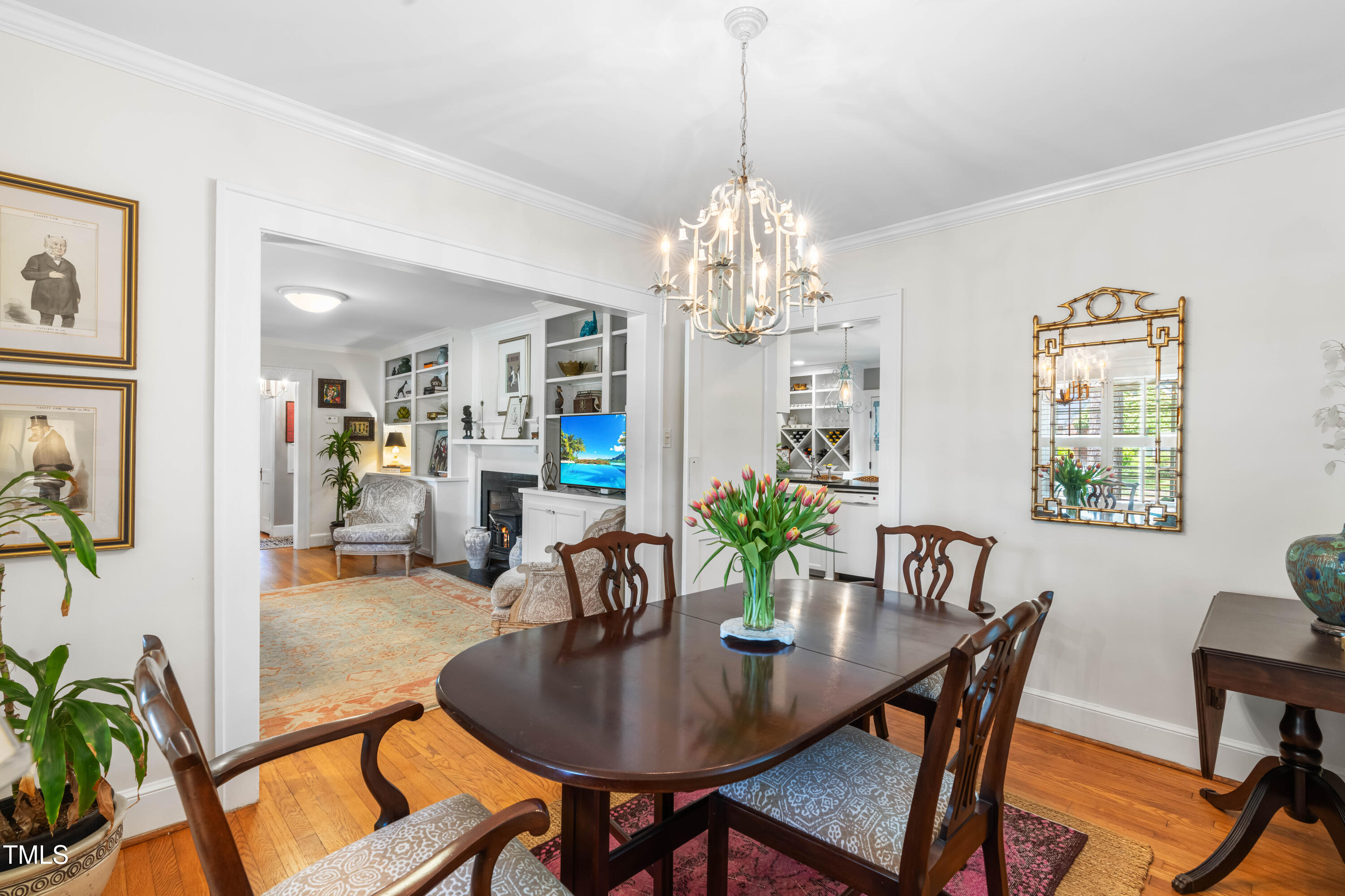 2725 Bedford Avenue Raleigh, NC 27607 - Photo 10 of 48 a view of a dining room with furniture window and wooden floor