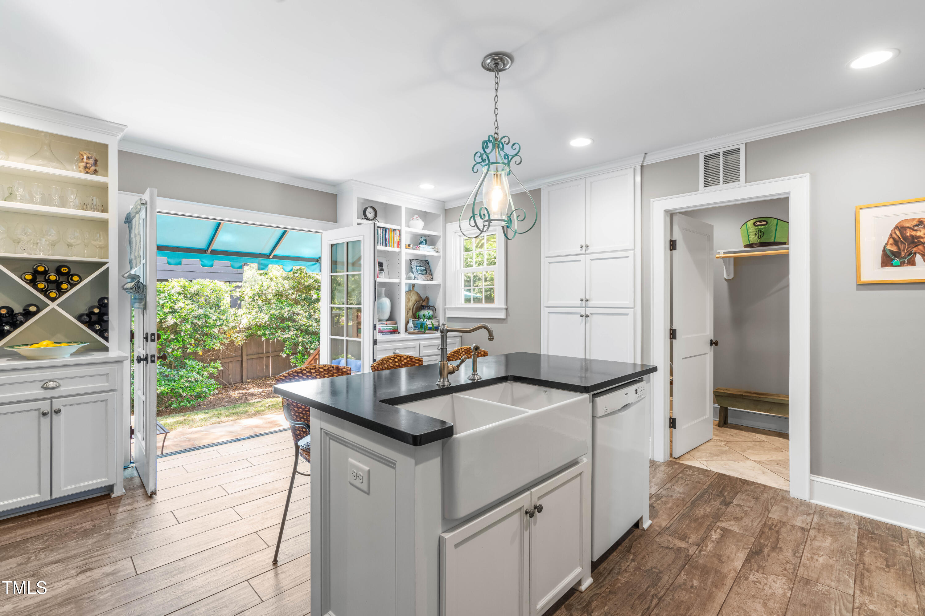 2725 Bedford Avenue Raleigh, NC 27607 - Photo 11 of 48 a kitchen that has a lot of counter space and a sink
