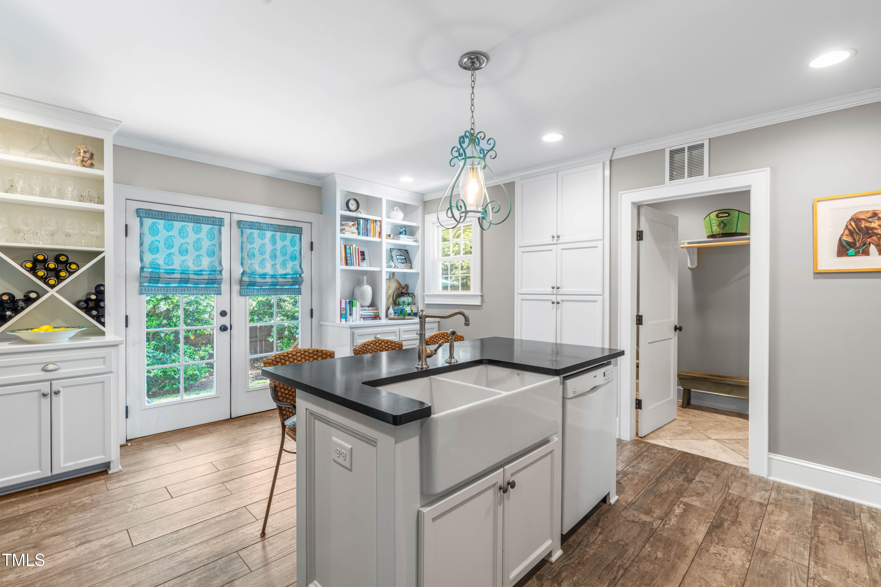 2725 Bedford Avenue Raleigh, NC 27607 - Photo 14 of 48 a kitchen that has a sink a counter space and a window
