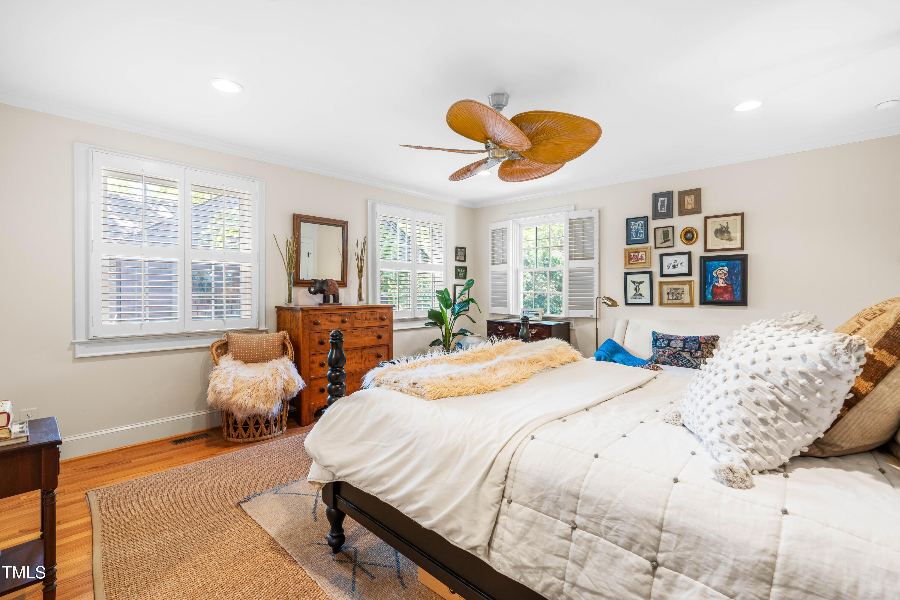 2725 Bedford Avenue Raleigh, NC 27607 - Photo 19 of 48 a bedroom with double bed and a large window