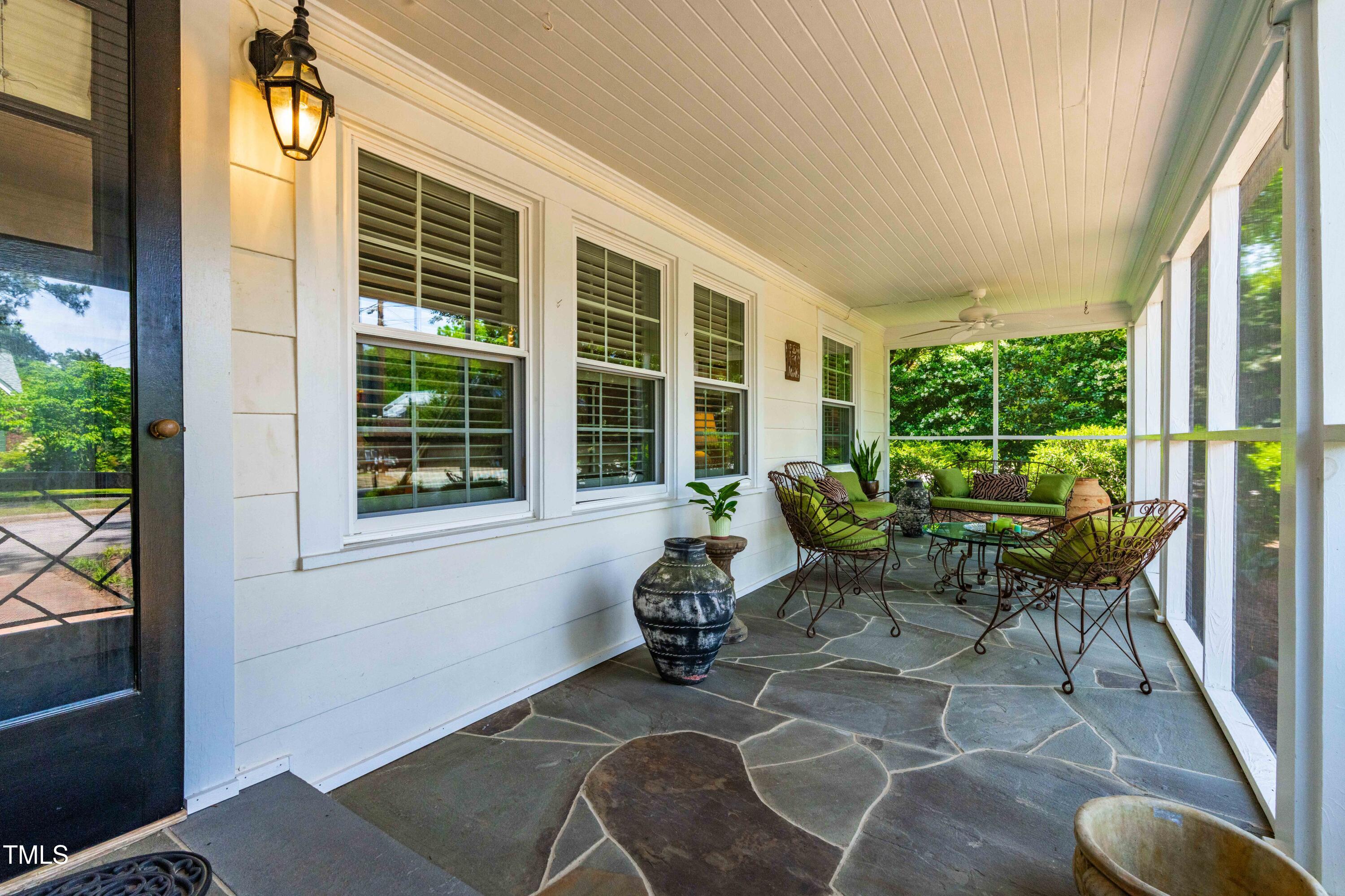 2725 Bedford Avenue Raleigh, NC 27607 - Photo 2 of 48 a house view with a seating space