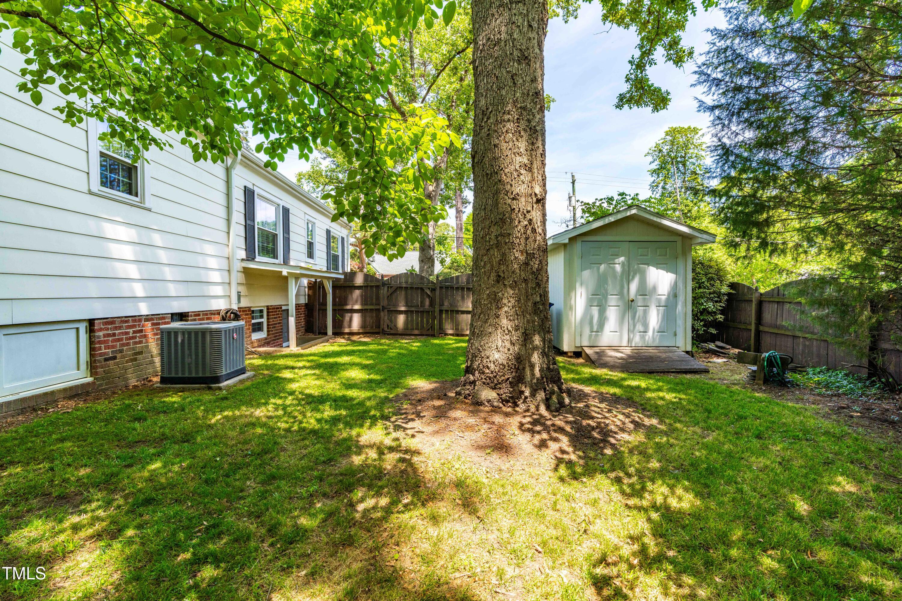 2725 Bedford Avenue Raleigh, NC 27607 - Photo 37 of 48 a view of a house with backyard and sitting area