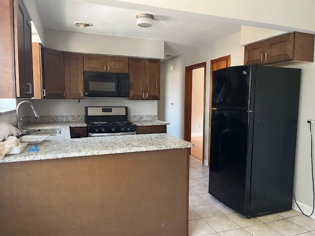 6100 South Kenneth Avenue, Unit 2 Chicago, IL 60629 - Photo 5 of 14 a kitchen with granite countertop a refrigerator and a sink