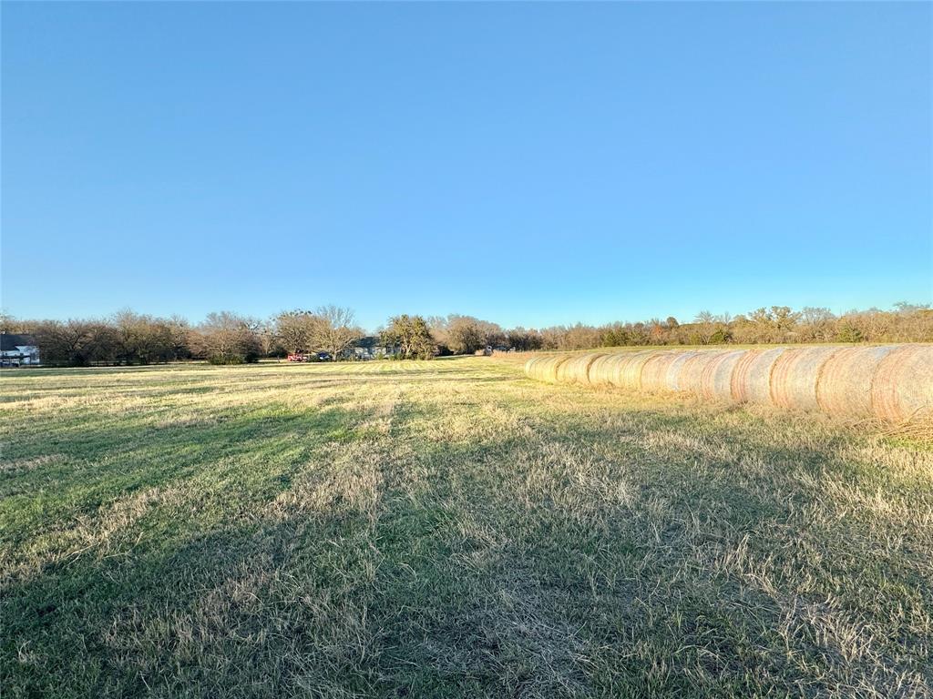 738 Cole Street Gainesville, TX 76240 - Photo 12 of 23 a view of a lake with houses in the back