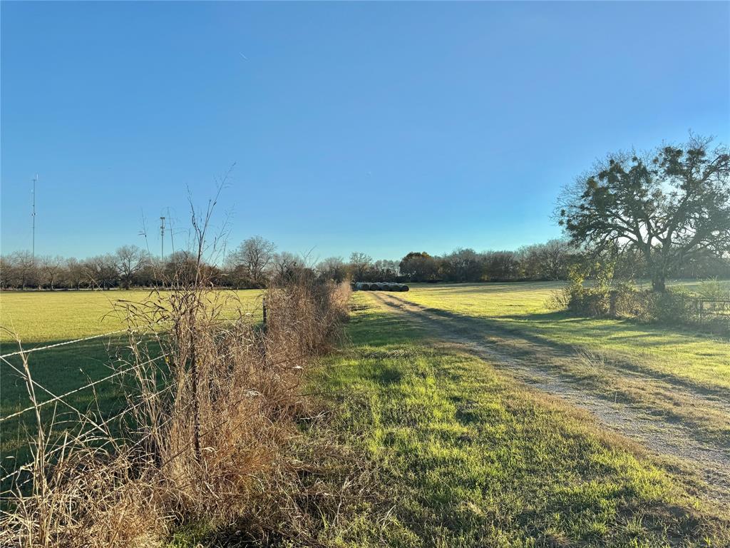 738 Cole Street Gainesville, TX 76240 - Photo 21 of 23 a view of a lake with a big yard