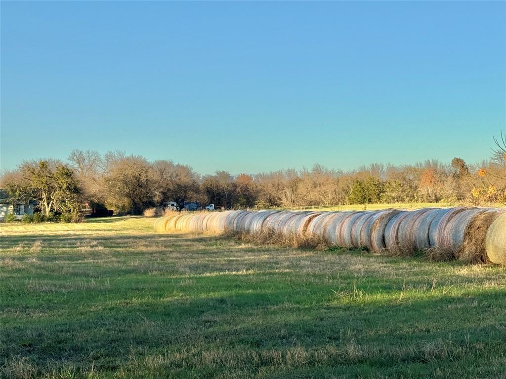 738 Cole Street Gainesville, TX 76240 - Photo 4 of 23 a swimming pool with outdoor seating and yard
