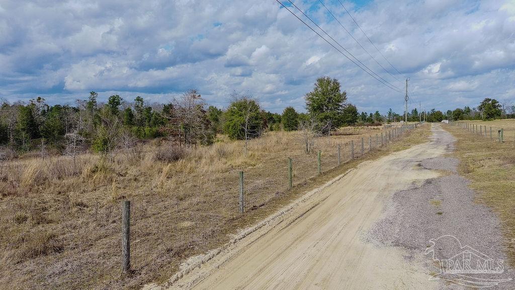 20-acres Tanner Ridge Road Milton, FL 32570 - Photo 22 of 25 a view of a dry yard with wooden fence
