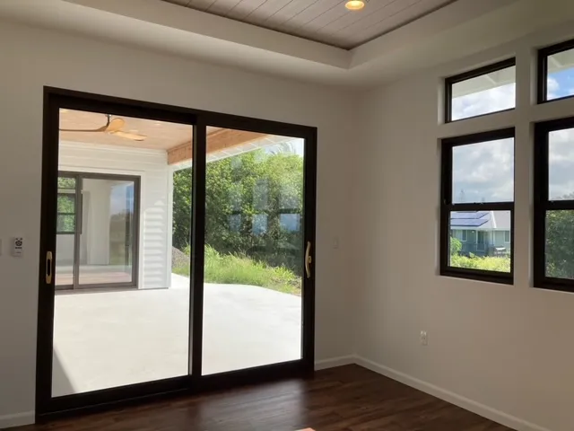 a view of a room that has a large window