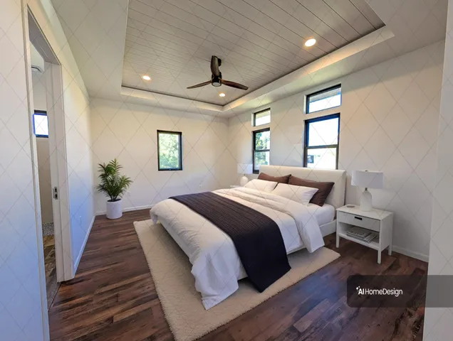 a bedroom with bed and wooden floor