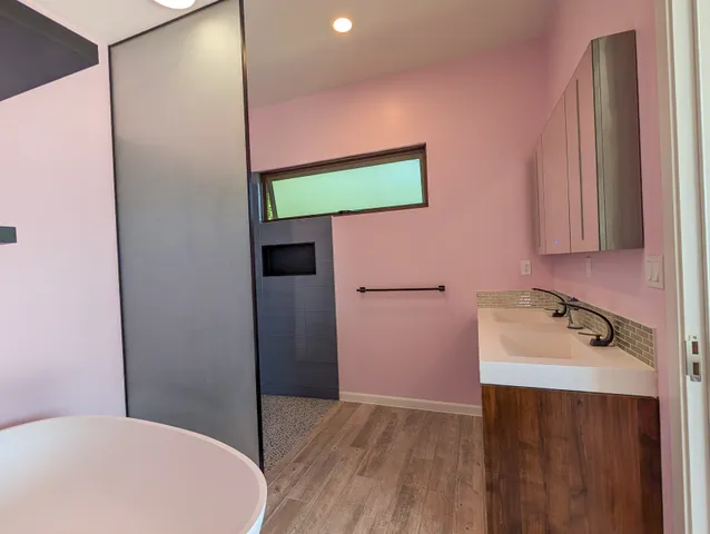 a bathroom with a sink and a mirror