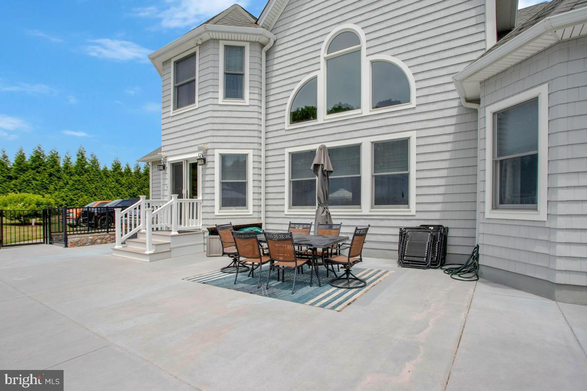 5 Jessie Road Harwood, MD 20776 - Photo 79 of 87 a view of a house with patio and sitting area