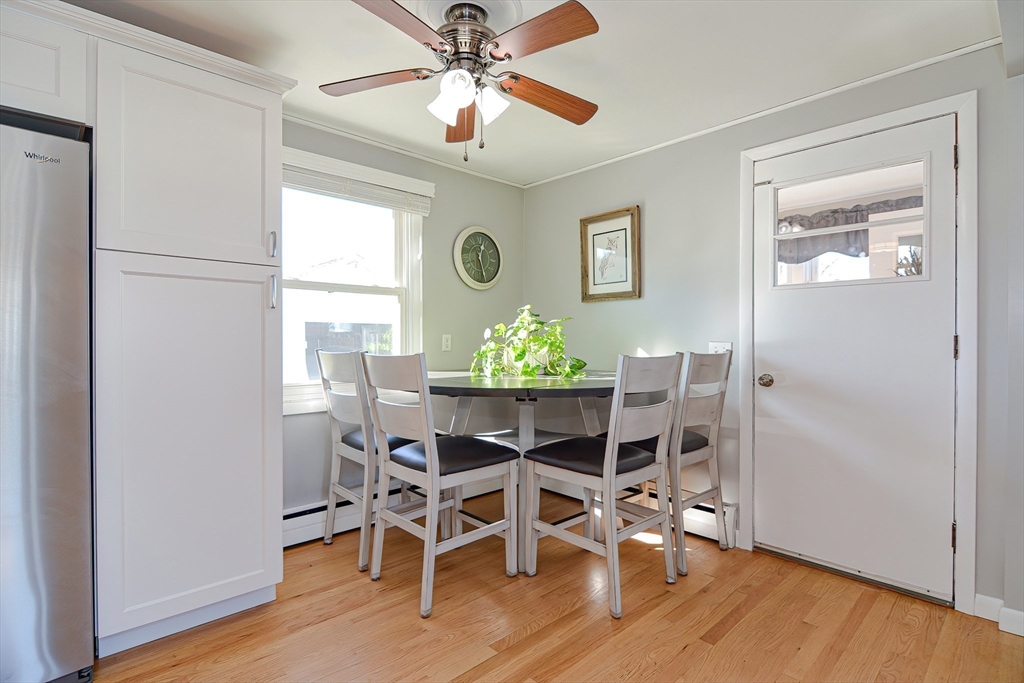 41 Kenyon Road Tiverton, RI 02878 - Photo 7 of 38 a view of a dining room with furniture window and wooden floor